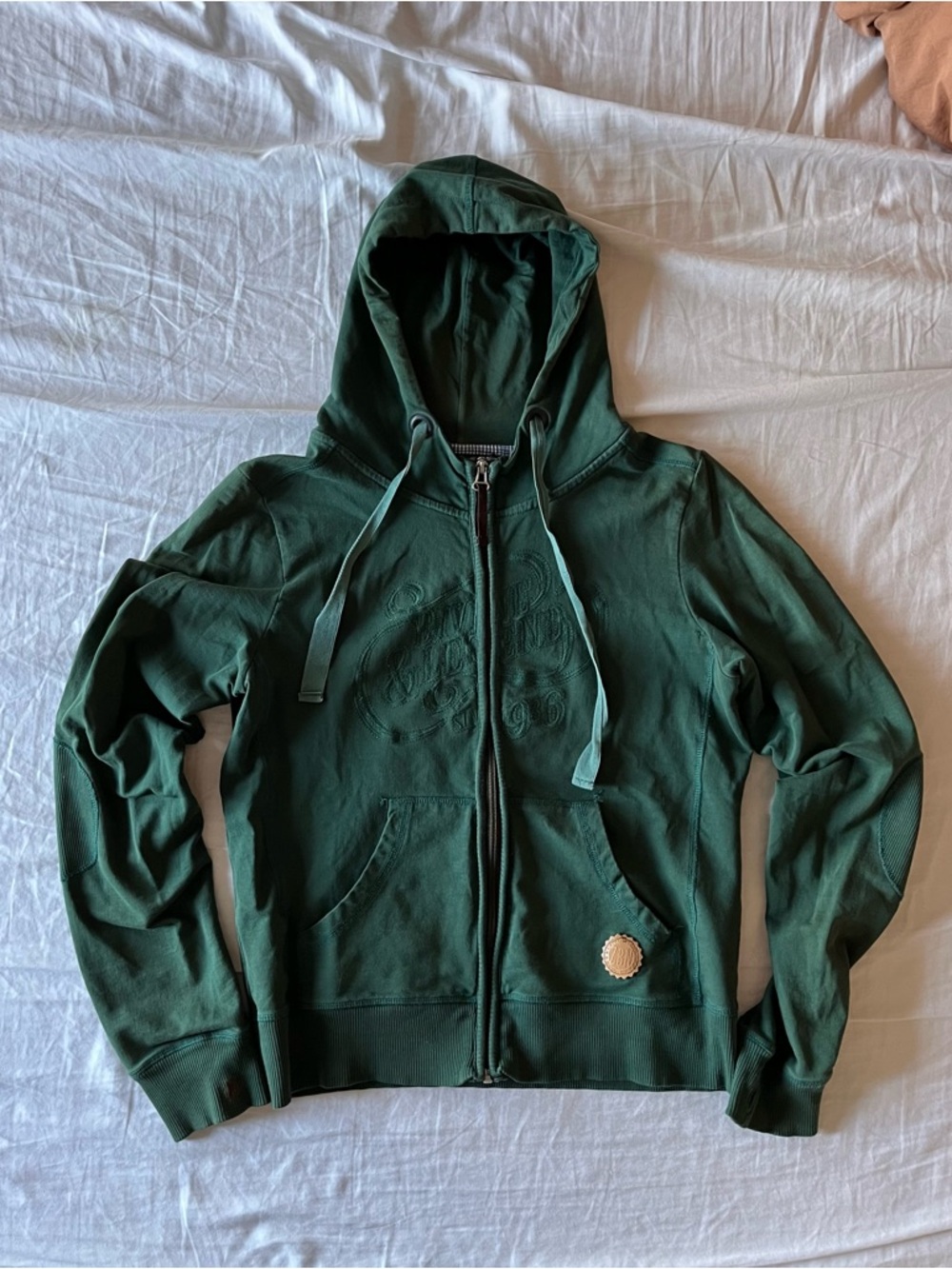 Zabaione Forest Green Zip-Up Hoodie with Subtle Embroidered Logo